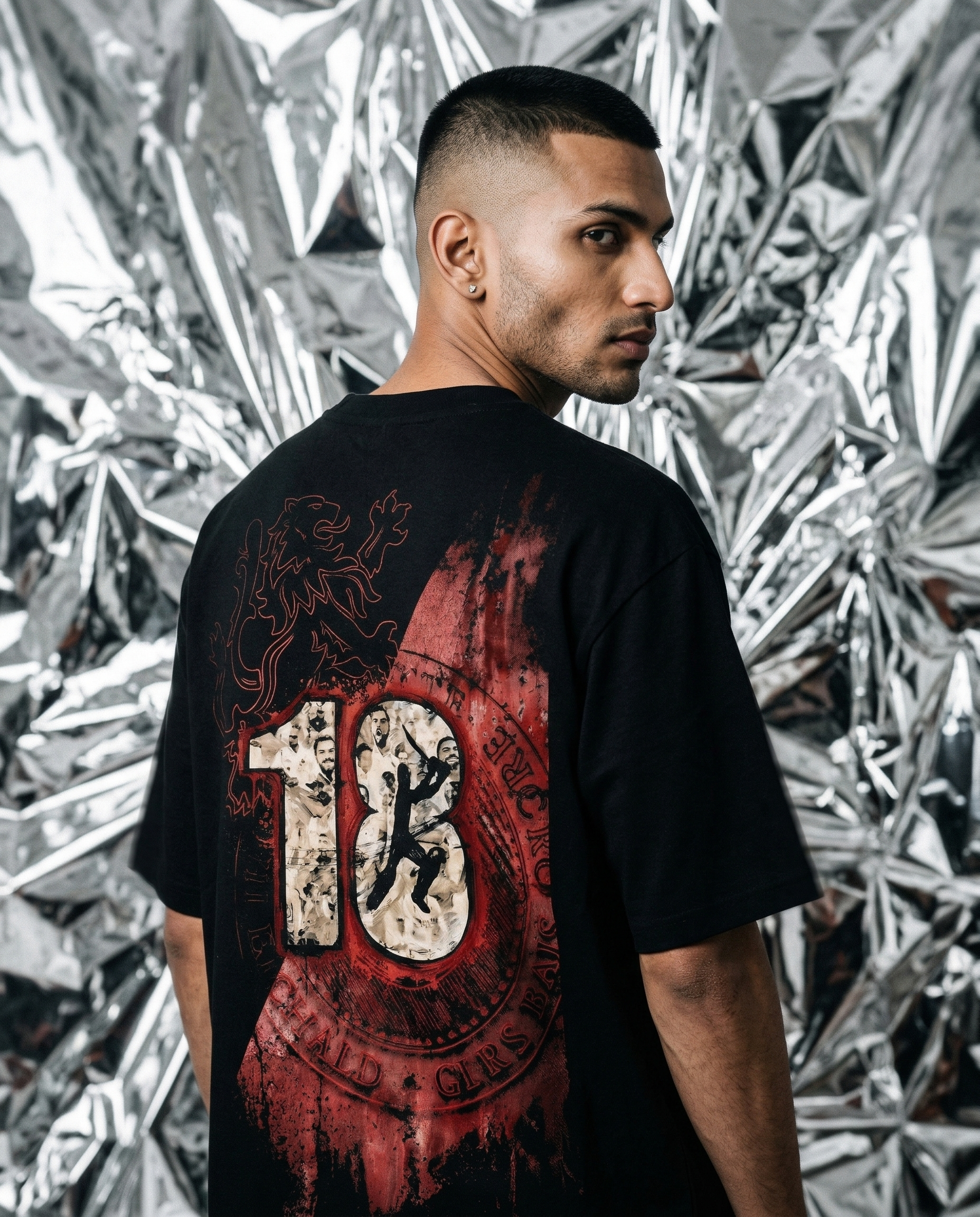 Studio — crumpled silver mylar sheet, reflective  | strobe + ambient mix — fr