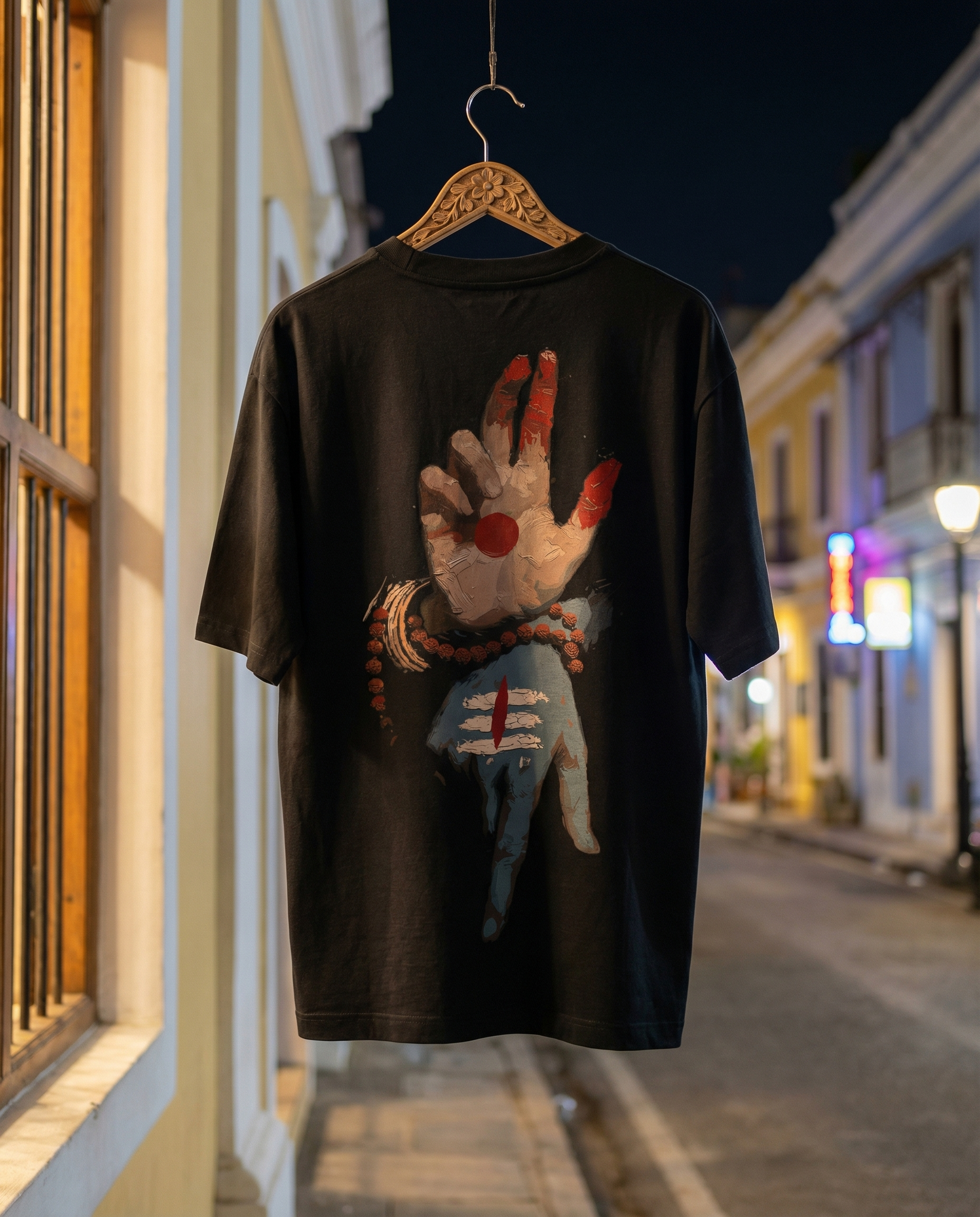 Hanger — suspended in a Pondicherry French-quarter street, pastel colonial